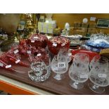 A tray of glass including dismantled cranberry glass epergne and six etched brandy glasses ETC