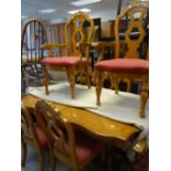 A modern continental-style extending light-wood dining table and 4+2 chairs Condition reports