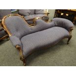 A fine Victorian mahogany framed serpentine back, carved chaise longue (with later upholstery to