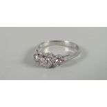 Platinum 18ct three-stone diamond ring Condition reports provided on request by email for this