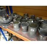 Parcel of assorted pewter to include various sized tankards, jugs together with twin-handled tray,