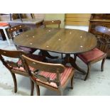 A twin-pedestal mahogany dining table and four antique mahogany chairs (distressed) Condition