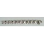 A vintage silver bracelet with hinging links set with pseudo-diamonds (BBC Bargain Hunt) Condition