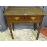 AN EARLY 19th CENTURY OAK SINGLE DRAWER SIDE TABLE, the planked top with moulded edging over an