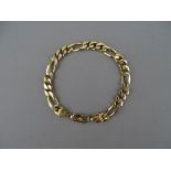 A NINE CARAT GOLD FIGARO STYLE LINK BRACELET, 21.4 grms