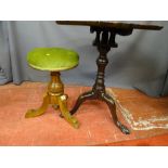 AN ANTIQUE MAHOGANY TILT TOP TRIPOD TABLE with birdcage sub frame and piecrust top, having carved