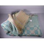 A TRADITIONAL WELSH WOOLLEN BLANKET in green, yellow and pink tones with original Holytex label (