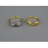 AN UNMARKED GOLD TWIN CLUSTER DIAMOND RING, each cluster having a centre stone of visual estimate