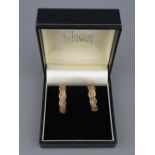 A PAIR OF NINE CARAT CLOGAU GOLD TWIST HOOP EARRINGS, circa 1995, 6.5 grms gross