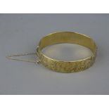 A GILT SILVER HALF BRIGHT CUT BANGLE, 44 grms, Birmingham 1968