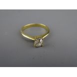 AN EIGHTEEN CARAT GOLD DIAMOND SOLITAIRE RING, visual estimate 0.65 carat, 3 grms gross, size N/