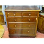 A VICTORIAN MAHOGANY CHEST OF TWO SHORT OVER THREE LONG DRAWERS having cockbeaded edging and