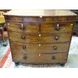 A VICTORIAN MAHOGANY BOW FRONT CHEST OF TWO SHORT OVER THREE LONG DRAWERS with diamond shaped