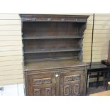 European oak canopy topped dresser with chamfered panel base cupboards, 174 cms high, 126 cms