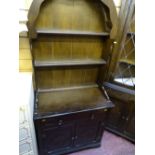 Small polished wood dome topped dresser