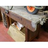 Vintage wooden workbench with two bolt-on vices and a built-in Woden 192 vice