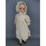 Vintage Armand Marseilles porcelain headed doll, incised to the back 'Made in Germany, Floradora,