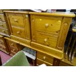 Pine six drawer dressing table and stool and a matching pair of two drawer bedside chests