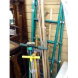 Parcel of various long handled garden tools, metal framed stepladder, galvanized watering can and