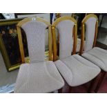 Set of four modern light wood upholstered backed dining chairs