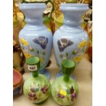 Pair of Victorian enamel decorated milk glass vases along with a smaller floral painted pair