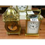 20th Century brass cased four pane carriage clock with key and a reproduction brass lantern clock