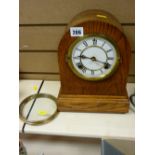 Oak encased mantel clock with painted dial