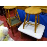 Two light wood stools, one other faux leather topped dressing stool and a pine dressing stool