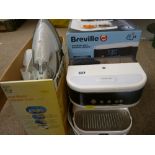 Boxed Phillips cordless steam iron and a boxed Breville bedside hot drinks maker E/T