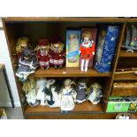 Large quantity of boxed and unboxed display dolls, some on stands