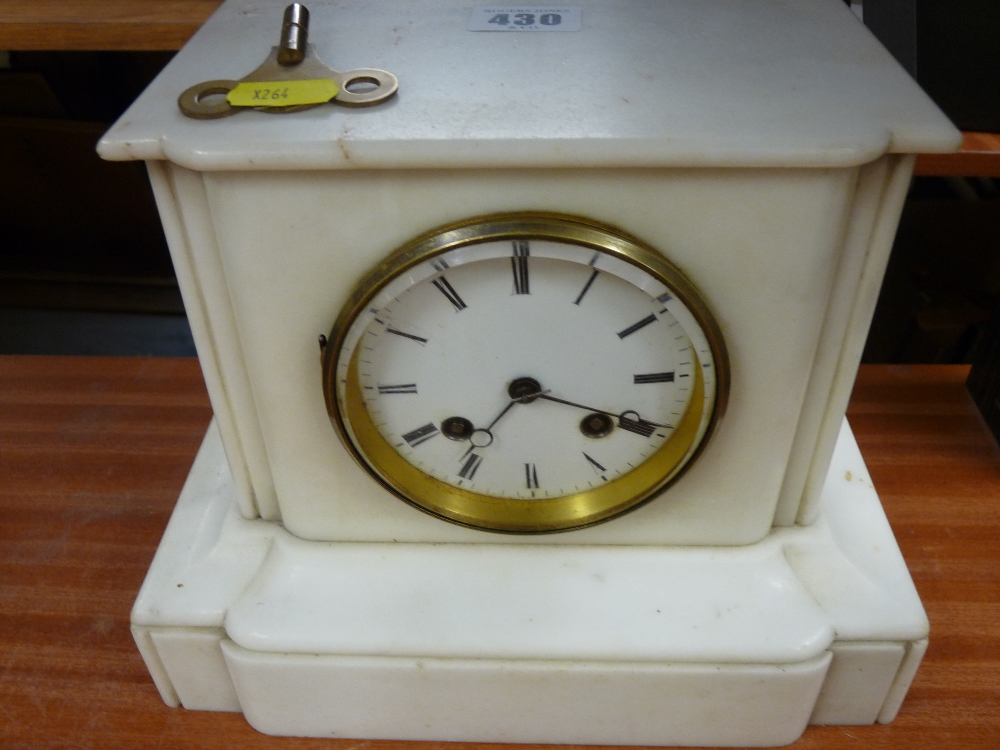 Victorian white marble mantel clock with French brass bell chime movement and key
