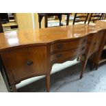 A reproduction inlaid mahogany serpentine sideboard Condition reports provided on request by email