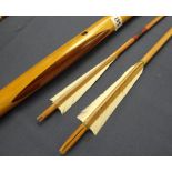 A modern crafted yew longbow with two arrows with blue denim case Condition reports provided on