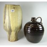 A studio pottery vase with narrow base and open neck, 39cms high together with a studio pottery