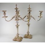 Pair of silver plated two-branch candelabra overall with scroll and foliate decoration and