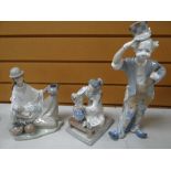 Three Lladro figures one being a South American lady in traditional costume seated with child,