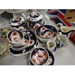 A quantity of Gaudy Welsh teaware including teapot and sucrier together with Gaudy Welsh jugs