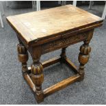 An unusual antique reproduction modular oak coffee table on carved bulbous supports Condition