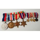 A bar of four WWII medals with ribbons to Reg J Pollard, includes Italy Star, 1939-1945 Star and