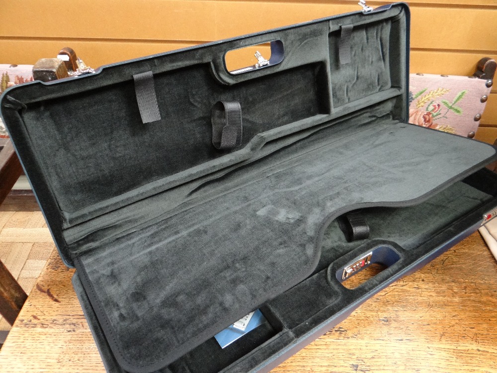 A Beretta (as new) blue shotgun case with combination lock and paperwork, 80cms (RRP £500)