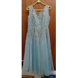 Vintage ladies turquoise evening dress with floral and scroll design Condition reports provided on