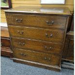 A vintage oak chest of four graduated drawers with swan neck handles, 91cms wide Condition reports