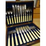 Cased complete set of twelve EPNS fish knives and forks in fitted case with brass inlaid shield