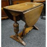 A good antique reproduction drop-leaf oval table having carved bulbous supports Condition reports