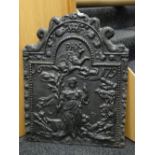 A believed Victorian cast iron fire back relief decorated with figurine in a landscape and later