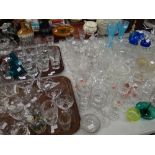 A large parcel of mixed glassware including drinking glasses, vases ETC Condition reports provided