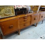 A mid-century teak long sideboard together with a reproduction serpentine sideboard Condition