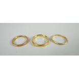 Three 22ct yellow gold wedding bands, 8grams Condition reports provided on request by email for this