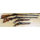 Two antique rifles and two antique pistols, the pistols with Georgian crown proof marks to the