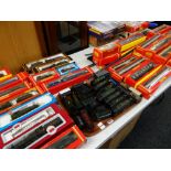 A large collection of 00 gauge railway items, mainly by Hornby and including boxed sets of 'Harry